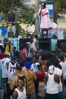 WEST INDIES, St Vincent & The Grenadines, Union Island, Singer and guitarist with sound system at