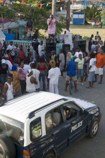 WEST INDIES, St Vincent & The Grenadines, Union Island, Singer singing to and about police at