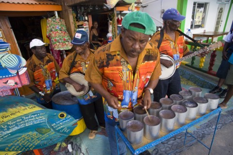 WEST INDIES, St Vincent & The Grenadines, Union Island, Miniature steel drum pan player and band