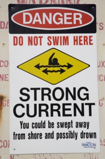 WEST INDIES, Barbados, St Andrew, Warning sign of strong currents off the coast at Barclays Park