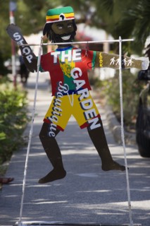 WEST INDIES, St Vincent & The Grenadines, Bequia, Colourful sign for clothes shop on Belmont