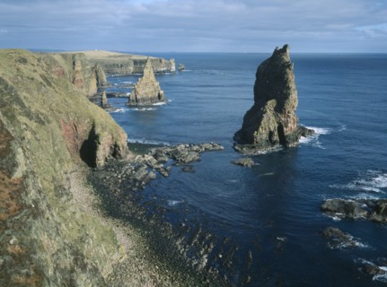 SCOTLAND, Highland, Duncansby Head, Stacks of Duncansby.  Pointed sea stacks off the North East