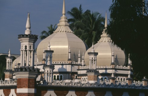 MALAYSIA, Kuala Lumpur, Masjid Jamek or Friday Mosque.  Exterior with domed roof and red and white