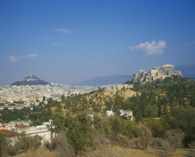 GREECE, Central, Athens, Acropolis and Lykavitos in the distance.View of the countryside with the