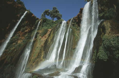 MOROCCO, Middle Atlas, Cascades d’Ouzoud, Waterfalls of the Olives.  Multiple falls cascading over