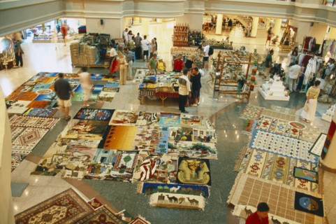 EGYPT, Red Sea Coast, Sharm el Sheikh, "Naama Bay shopping centre, carpets laid out on display."