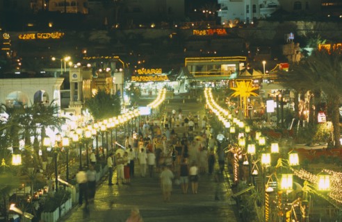EGYPT, Red Sea Coast, Sharm el Sheikh, Naama Bay shopping centre and restaurants at night