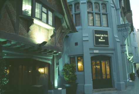 ENGLAND, East Sussex, Brighton, Hotel Du Vin frontage lit up in evening light.