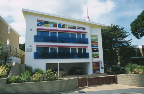 ENGLAND, Dorset, Sandbanks, Colourful apartment block called Lucys hill.