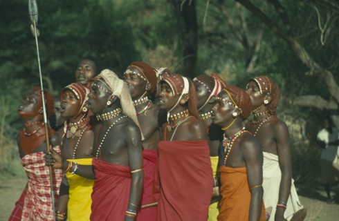KENYA, South Horr, Samburu moran warriors singing.