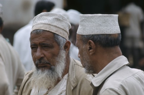 TANZANIA, Zanzibar Island, Zanzibar Town, Two Muslim men.