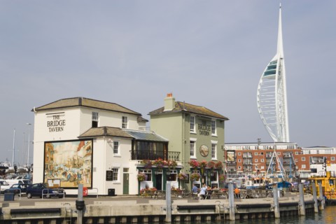 ENGLAND, Hampshire, Portsmouth, The Camber in Old Portsmouth showing the Spinnaker Tower behind the