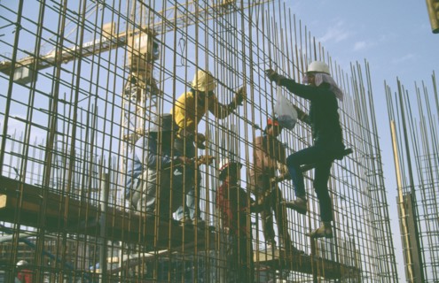 SAUDI ARABIA, Work, Construction workers on building site.