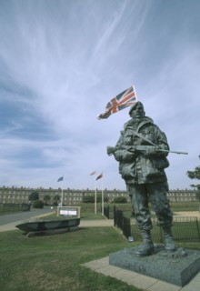 ENGLAND, Hampshire, Portsmouth, Royal Marines Museum. Large statue of a Royal Marine holding gun on