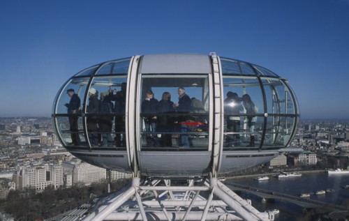 ENGLAND, London, British Airways London Eye capsule and the London skyline.