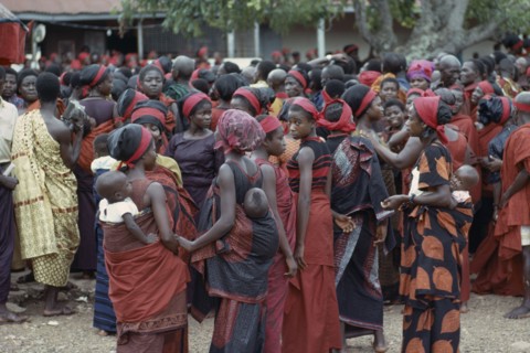 GHANA, Tribal People, "Group of women carrying babies on their backs at Ashanti funeral, dressed in