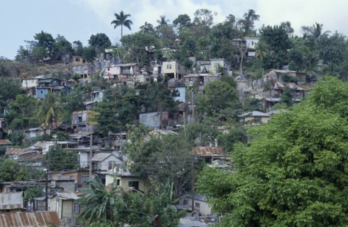 JAMAICA, Montego Bay, Norwood, "Overcrowded slum area, shanty housing on hillside with corrugated