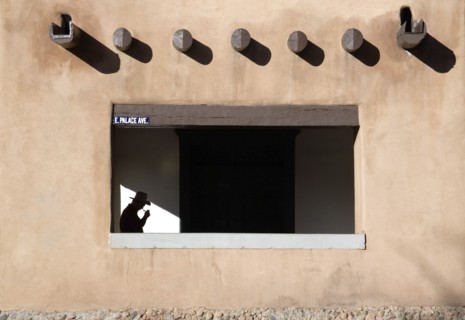 USA, New Mexico, Santa Fe, Detail of the Palace of The Governors in the Plaza with a man wearing a