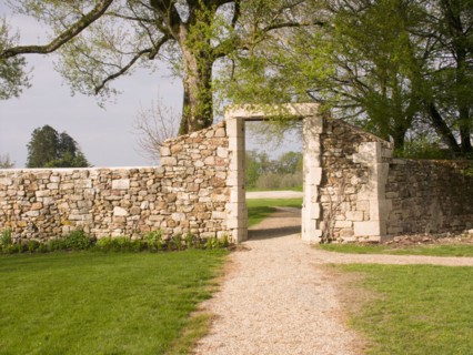FRANCE, Deux Sevres Region, Poitiers, A doorway in the old stone wall surrounding the Chateau des