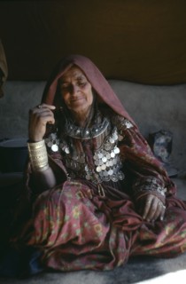 AFGHANISTAN, Paktia Province, Portrait of woman of the Jajia tribe wearing traditional dress and