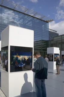 ENGLAND, East Sussex, Brighton, Photographic exhibition of Tsumani images outside the public
