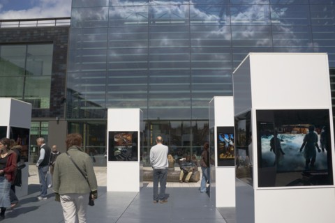 ENGLAND, East Sussex, Brighton, Photographic exhibition of Tsumani images outside the public