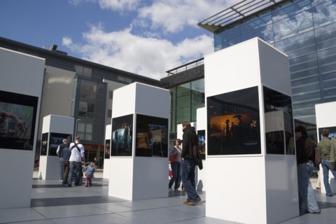 ENGLAND, East Sussex, Brighton, Photographic exhibition of Tsumani images outside the public