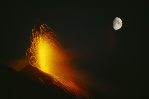 ITALY, Aeolian Islands , Stromboli, Eruption of Stromboli volcano by moonlight.