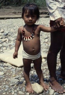 PANAMA, Candelaria, Choco Indian girl wearing monkey tooth necklace.