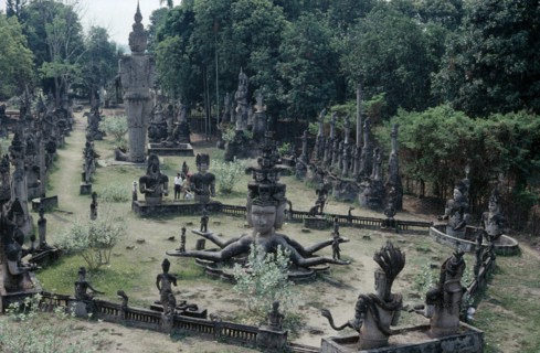THAILAND, Nong Khai, Wat Khaek, Buddha park. Collection of religious statues in a garden