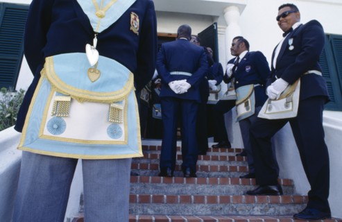 BERMUDA, St Georges, Cropped view of freemasons wearing regalia for the Peppercorn ceremony.