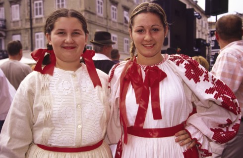CROATIA, Kvarner, Rijeka, "Habsburg jubilee, girls in traditional costume. The streets are a riot