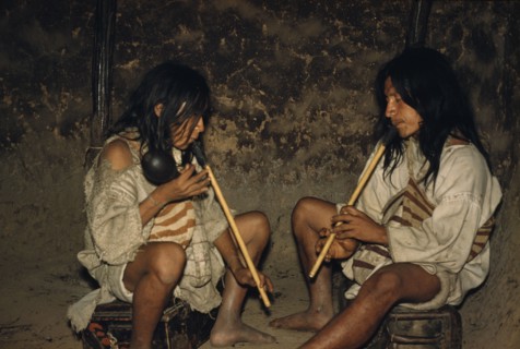 COLOMBIA, Sierra Nevada de Santa Marta, Kogi Tribe, Men playing “kuisi” flutes in San Miguel