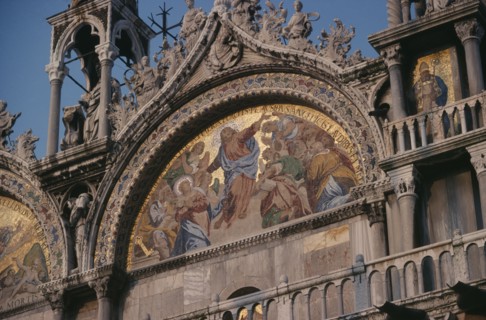 ITALY, Veneto, Venice, St Marks Square.  Detail of mosaic and carvings on exterior facade of