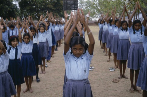 INDIA, Andhra Pradesh, Education, Primary school children starting day with physical exercise.