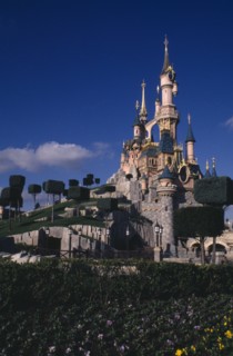 FRANCE, Ile de France, Paris, Disney Land seen from across gardens