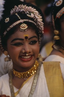 INDIA, Kerala, Thiruvananthapuram, "Mohiniyattam dancer at The Great Elephant March festival. Hair