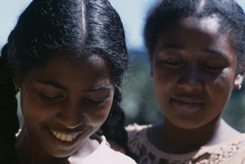 MADAGASCAR, People, Women, Road to Ranomanfana. Portrait of two young women smiling with their eyes