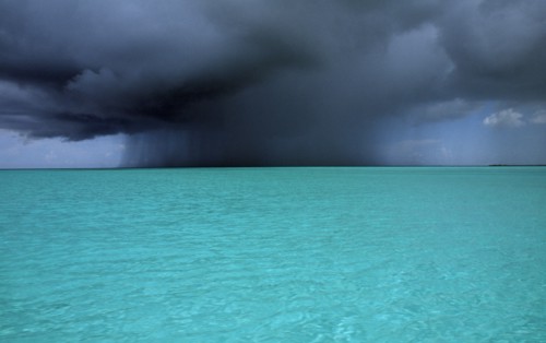 WEST INDIES, Turks and Caicos Island, Storm clouds over the ocean