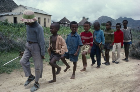 ERITREA, Keren Province , Children pretending to be soldiers marching in line.