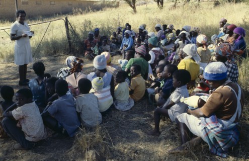 ZIMBABWE, People, Family Planning Association education officer and distributor talking to women on