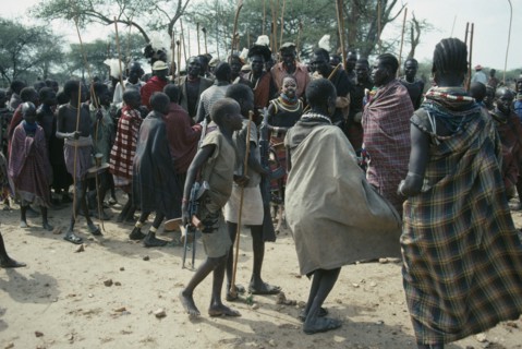 UGANDA, Karamoja District, Karamojong warriors at Akuidakin ceremony to bless cattle and ask for
