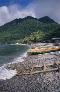 DOMINICA, Windward Islands, Soufriere Bay, Scotts Head fishing village. View across stoney beach