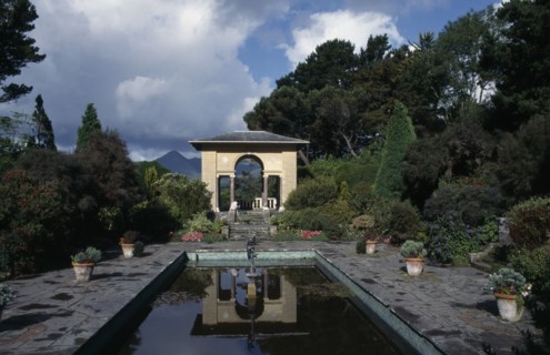 IRELAND, County Cork, Bantry Bay, Ilnacullin Garinish Island. The Italian Garden with view across a