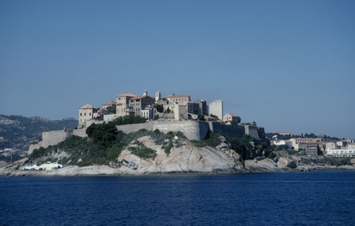 FRANCE, Corsica, Calvi, View across sea towards the fortified Citadel