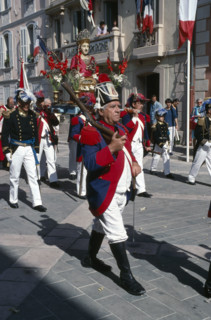 FRANCE, Provence Cote D Azur, Var, Saint Tropez. Bravade Festival with men in costume marching in a