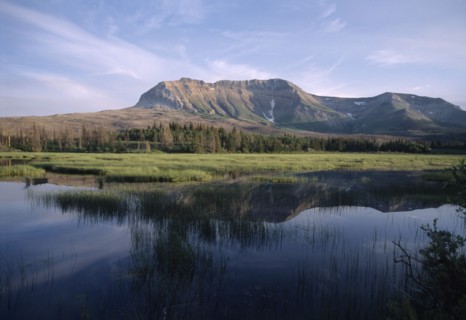 CANADA, Alberta, Waterton Lakes N.P., Landscape with Sofa Mountain reflected in lake.