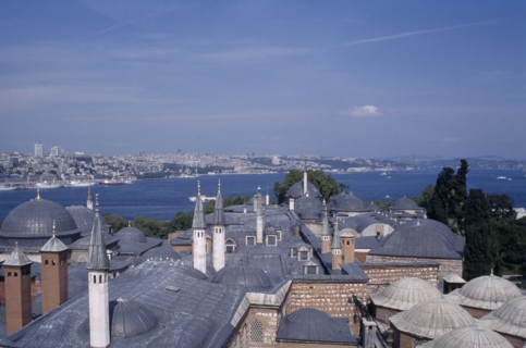 TURKEY, Istanbul, Topkapi Palace.  View across rooftops of the Harem to the Bosphorous.