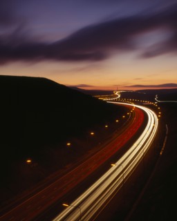 TRANSPORT, Traffic, Motorway, M62 Motorway. Elevated view over traffic in motion blur with light