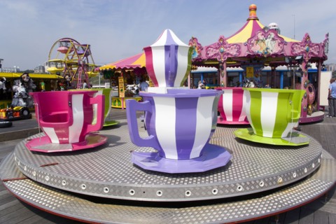 ENGLAND, Dorset, Bournemouth, Funfair ride of teapot and teacups on Bournemouth Pier